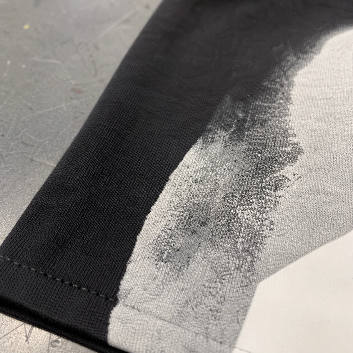 Illustrative DTG sample with dull uneven white coverage