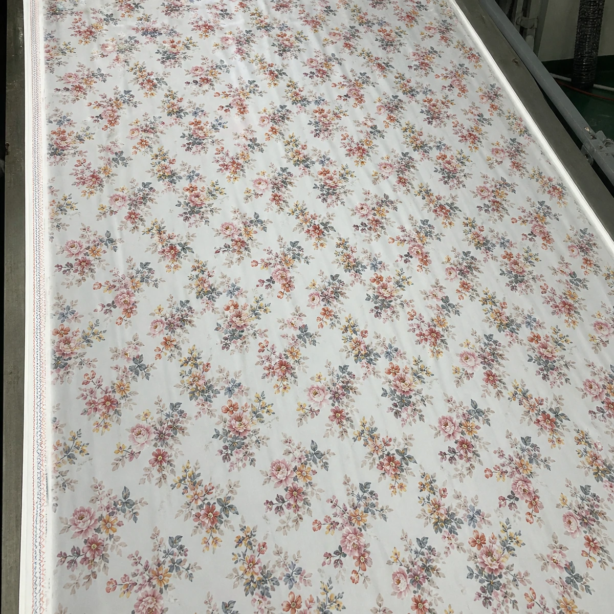 Illustrative digitally printed fabric with repeat skew during inspection