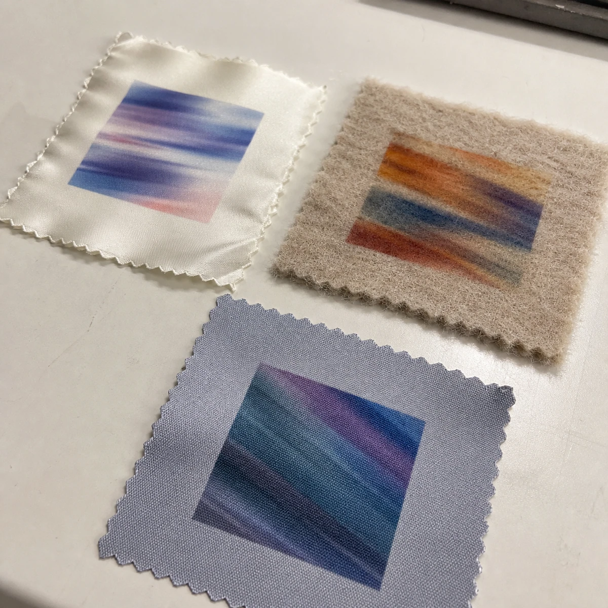 Silk wool and nylon swatches prepared for fibre-specific print review