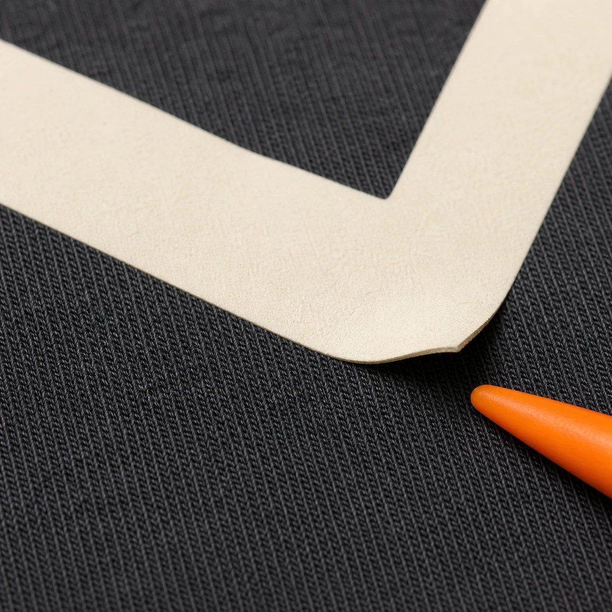 Local edge lift on a garment transfer sample