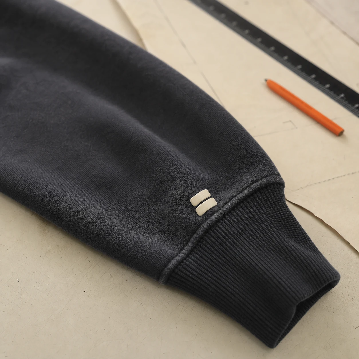 Small puff placement on a sleeve or jogger leg