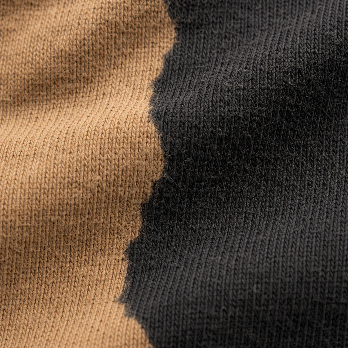 Close view of a discharge print on compatible dark cotton
