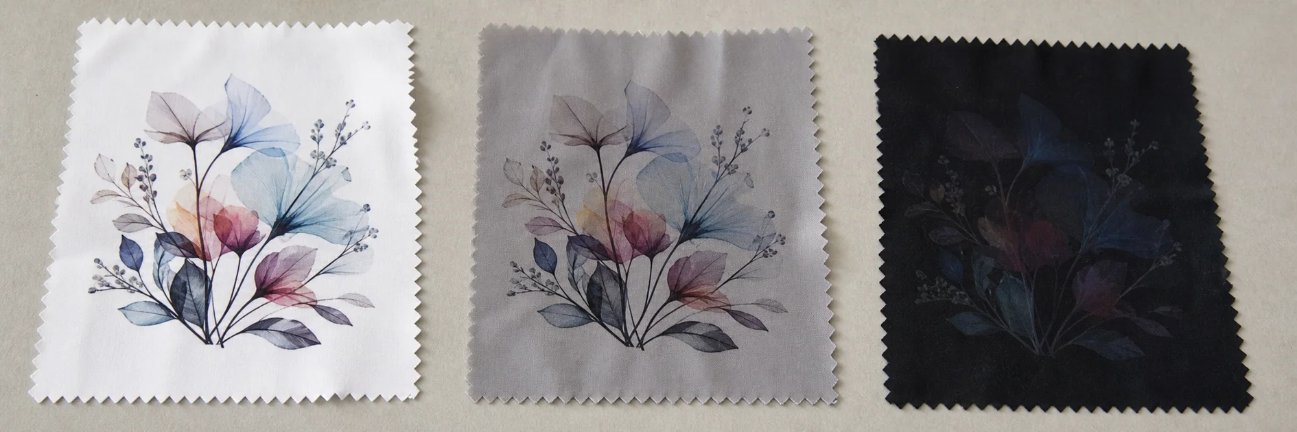 Same sublimation artwork compared on white light grey and black polyester